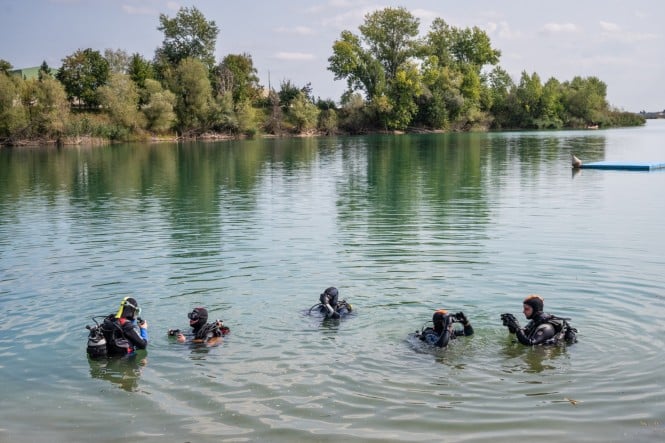 Potapljači in šolarji združili moči pri čiščenju Soboškega jezera