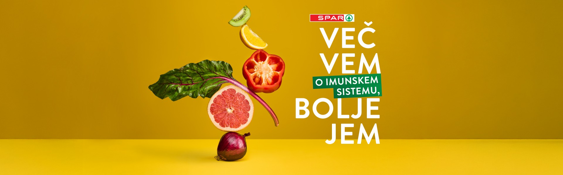Na rumeni podlagi je sadje in zelenjava