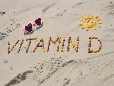 Napis vitamin D v mivki