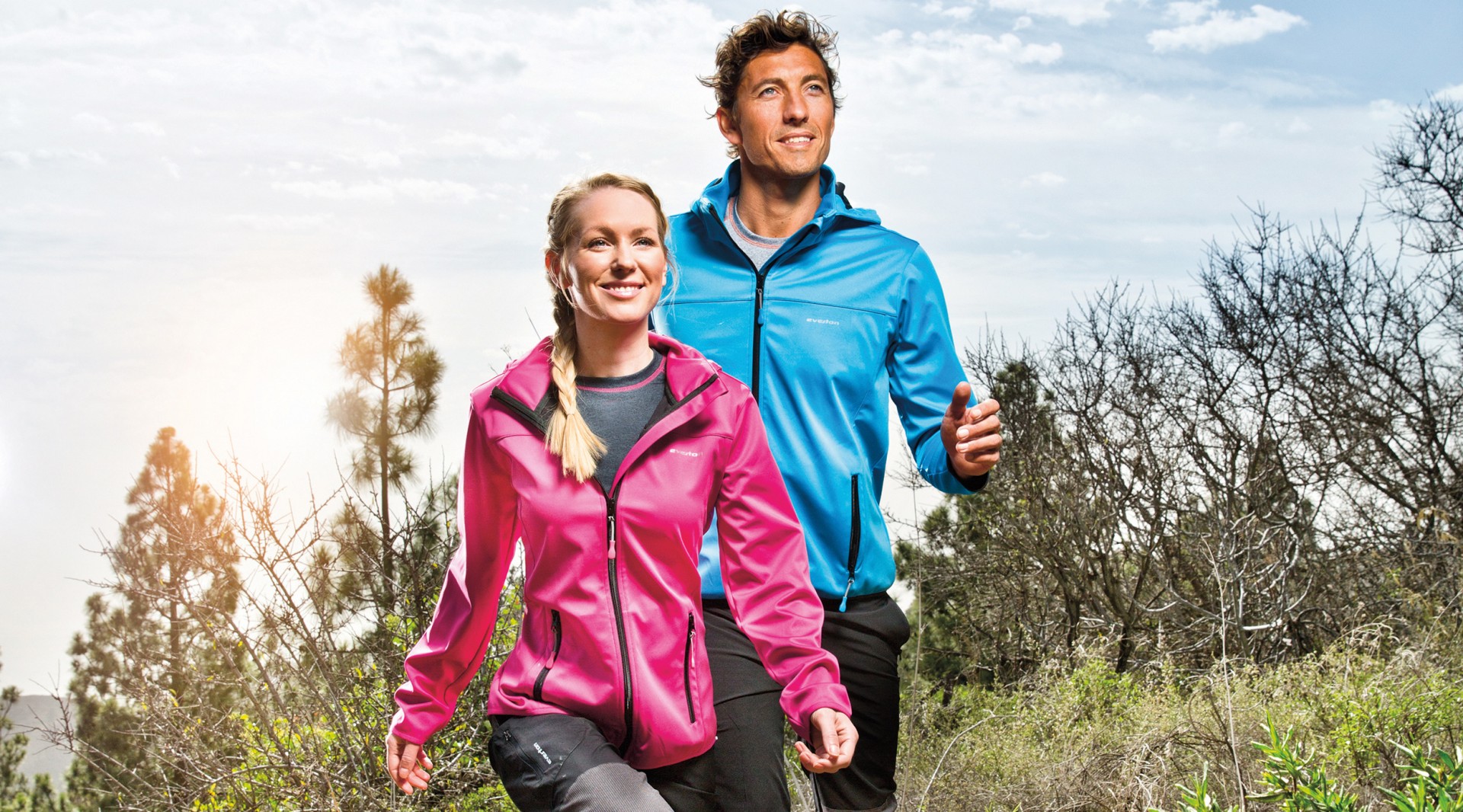 Everton Couple hiking in Everton clothes