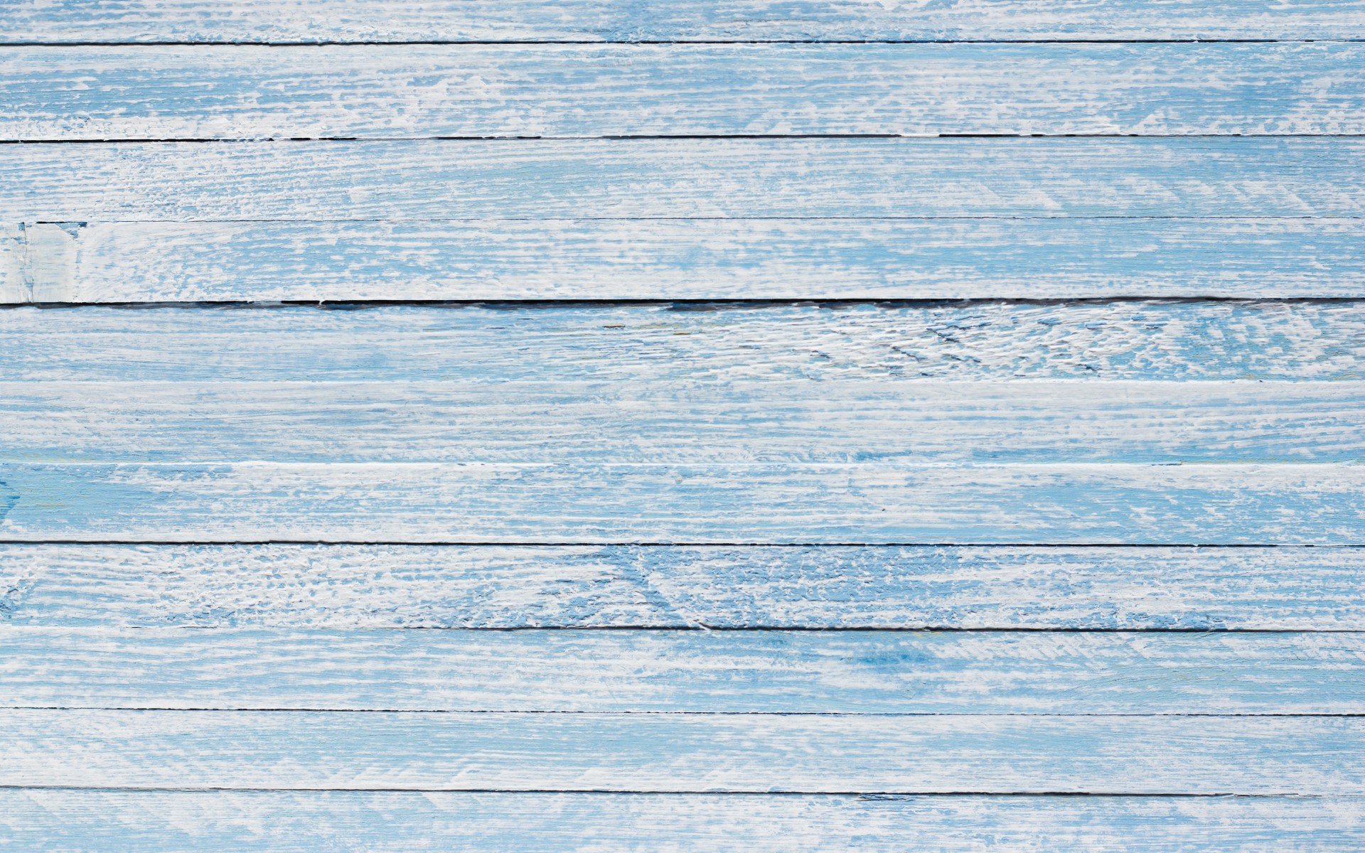 Light blue colored wooden background